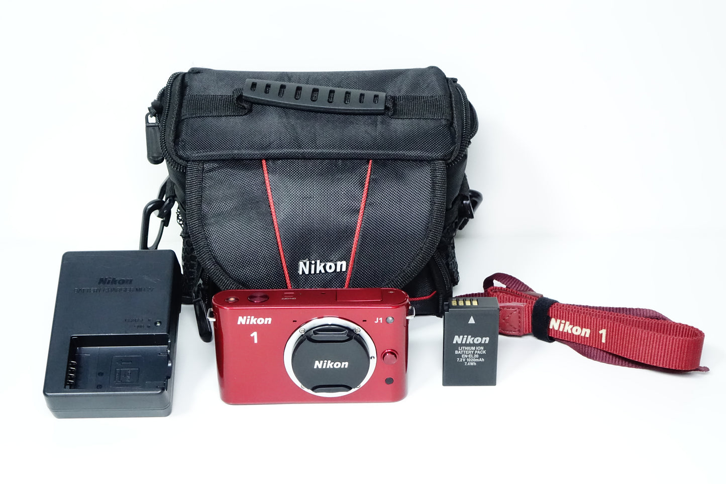 Nikon 1 J1 Mirrorless Rossa Body + Borsa - 2980 SCATTI - GARANZIA 12 MESI