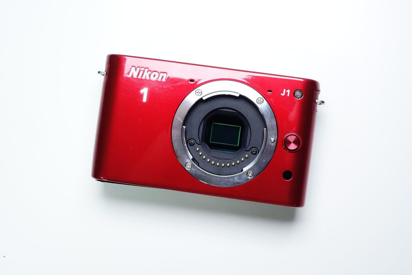 Nikon 1 J1 Mirrorless Rossa Body + Borsa - 2980 SCATTI - GARANZIA 12 MESI